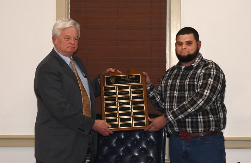 Lewes Mayor Ted Becker presents Streets Department employee Kenny Morris with the Elaine Bisbee Award. The award is presented annually to an employee who displays dedication, dependability, reliability and excellent work habits, and who is team-oriented and committed to providing quality service. NICK ROTH PHOTO