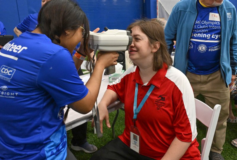 Emily Sharp of the Sussex Riptide squad gets her eyes checked as part of the Healthy Athletes events of Fit Feet and Opening Eyes.