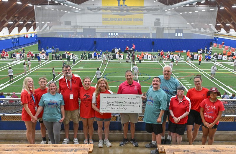 The third annual Fit & Fun Field Day took place June 1, raising $10,000 for Special Olympics Delaware. Proceeds benefit local athletes in their sports activities. Shown are (l-r) unified partner Shayne Van Zee, unified partner Sam Van Zee, Fit & Fun Field Day organizer and SODE volunteer Kristie Van Zee, athlete Justin Daisey, Fit & Fun Field Day organizer and unified partner Heather Smyth, Fit & Fun Field Day organizer and unified partner Lori Smyth, SODE President David Halley, athlete Connor Watson, Uncle David’s Ice Cream/Boardwalk Buddy Walk Executive Director Jim Watson, athlete Suzie Schaible, Sussex Riptide swim coach Cathy Gallagher and unified partner Mila Feathers.