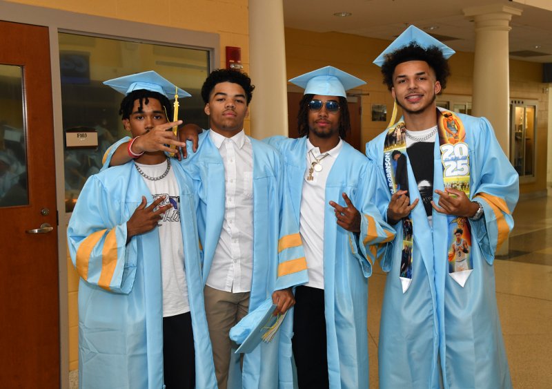 Friends awaiting the commencement lineup are (l-r) Chad Brittingham, Jayden Messick, Andrew Mosley and Damian Robinson.
