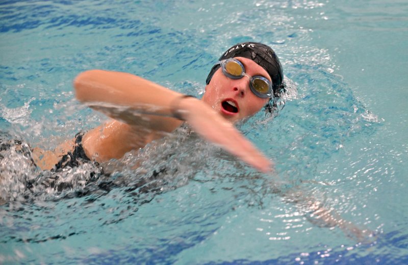 Senior Dilyla Rohls swims the freestyle.