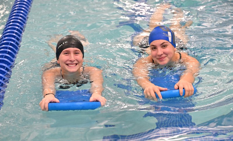 Seniors Dilyla Rohls, left, and Norah Block work on their kick at a recent practice.