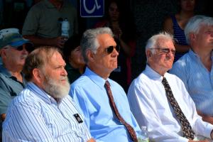 Brook Freeman, left, Bruce Freeman and Joe Hudson listen as Delaware River and Bay Authority Executive Director Scott Green talks about the legacy of Ted Freeman. Hudson was a life-long friend and the Freemans were nephews of Capt. Ted Freeman. BY RON MACARTHUR