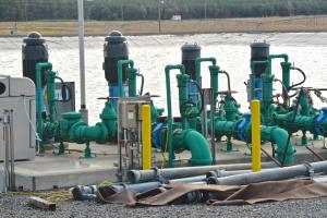High-powered irrigation pumps pull treated wastewater from storage lagoons to the Inland Bays spray irrigation system. BY RON MACARTHUR
