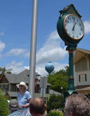 Vaughan addresses the crowd from in front of the Milton town clock. CHRIS FLOOD PHOTO