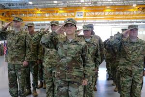 Schellinger salutes at the Oct. 4 deployment ceremony at her unit’s base in New Castle. SUBMITTED PHOTO