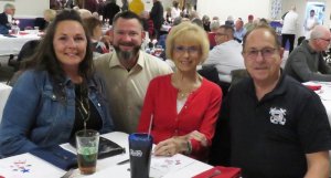 Enjoying the Elks Veterans Appreciation Dinner are (l-r) local Home Depot Manager Lindsey Fry, her husband Kacey, and Eileen and Gene Shellenberger. Gene, a U.S. Coast Guard retiree, serves as a member of the Elks Veterans Committee and works part time at the local Home Depot.