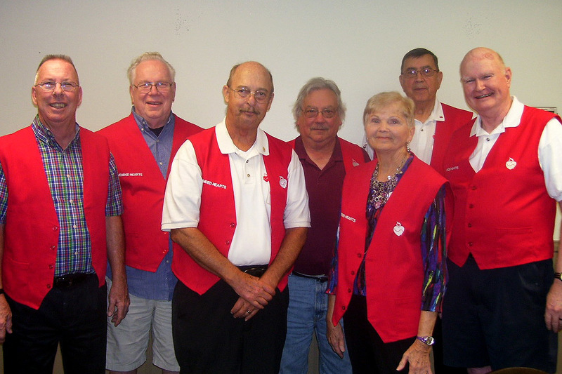 Mended Hearts volunteers include (l-r) Jim McBride, Charlie Tanner, Don Arvay, Bob Sine, Karen Kosinski, Carmen Campanicki and Larry Bremer.
