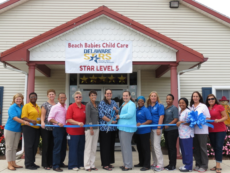 Beach Babies celebrates Delaware Stars fivestar rating with ribbon