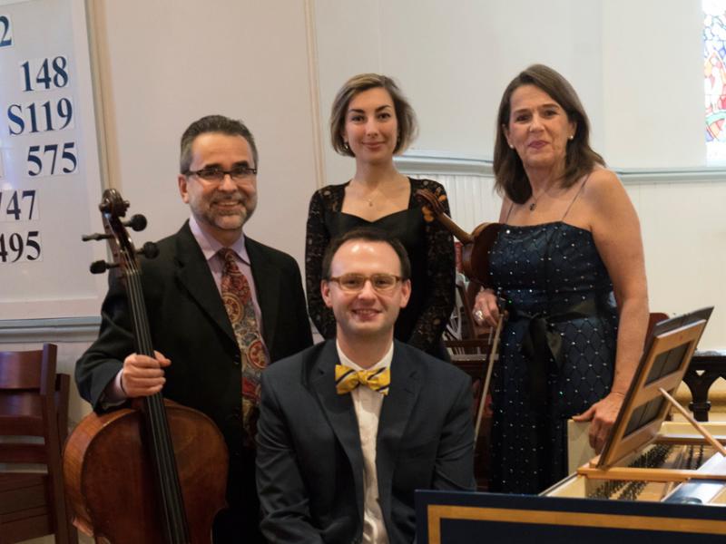 Two harpsichords built by Lewes resident Gerald Kaplan will be featured in the opening concert by Lewes Chamber Players, (l-r) cellist Ovidiu Marinescu, harpsichordist Anna Kislitsyna and violinist Sylvia Ahramjian. Seated is T.J. Thomas, organist and harpsichordist.