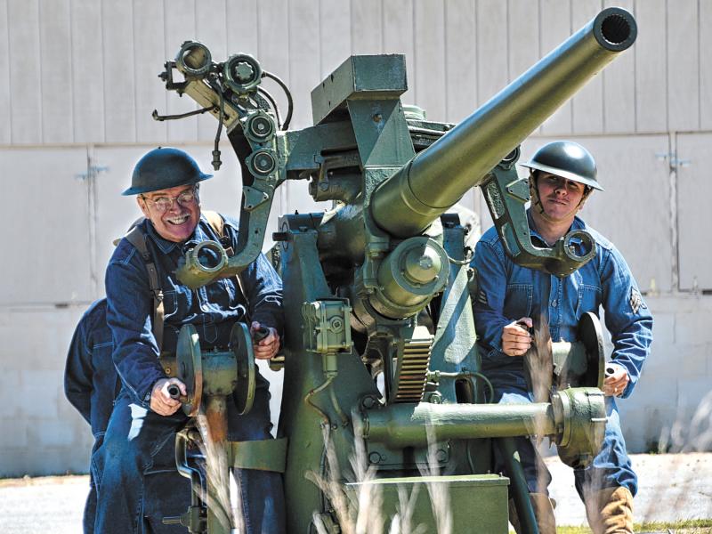 John Kelly, left, and Tom Minto prepare to fire one of Fort Miles’ 3-inch artillery guns during Delaware Goes to War. Each spring, the Fort Miles Historical Association and Delaware State Parks host Delaware Goes to War at the historic site in Cape Henlopen State Park used to defend Delaware Bay from a possible German attack during World War II. Re-enactors from throughout the region bring World War II equipment and vehicles to display as part of the living history program. RON MACARTHUR PHOTO