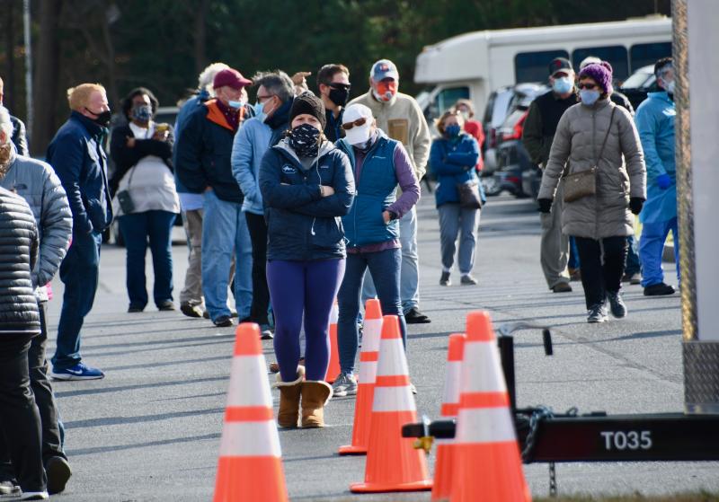 Lines are long Dec. 22 at a Curative COVID-19 testing site at Epworth UM Church near Rehoboth Beach.