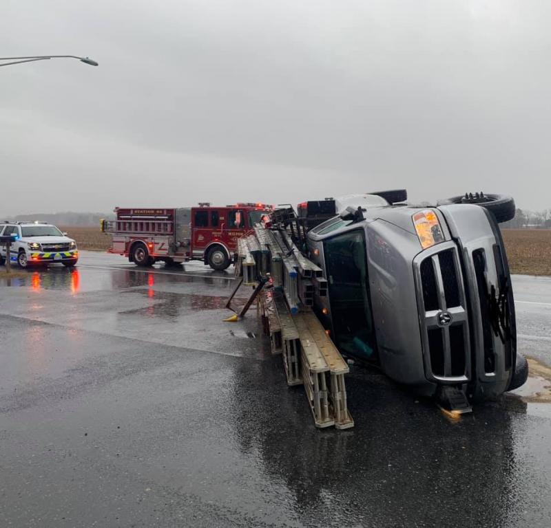Truck overturns off Route 16 west of Milton