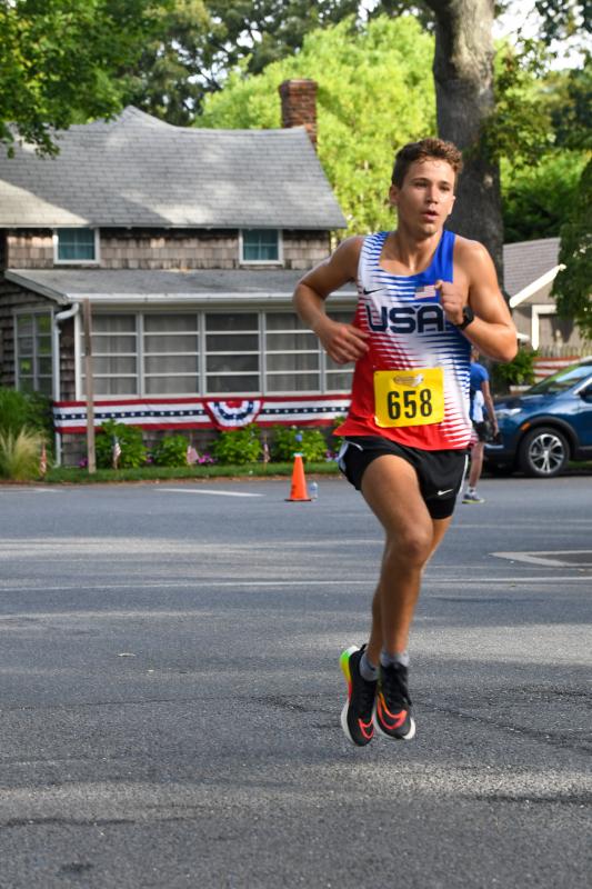 Garrett Ferguson take third in 16:17.