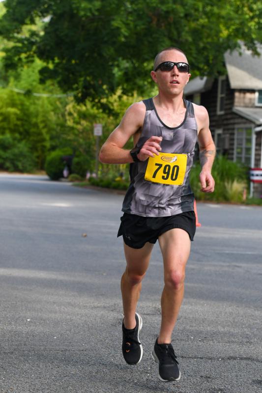 Dylan Smiley rounds out the top four with a time of 16:29.