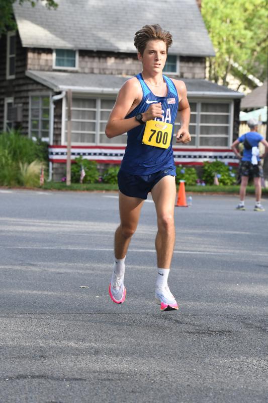 Dominic Kuntz, 15, runs 18:06.