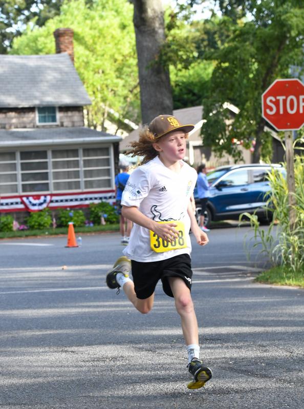 Cruz Tootell, 9, runs the course in 24:44.