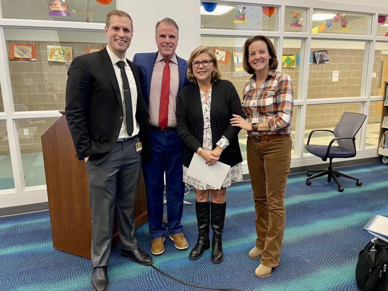 Long-term Love Creek Elementary substitute Susan Schatzman was also recognized with a GEM award. Gathered are (l-r) Love Creek Assistant Principal James McDowell, Superintendent Bob Fulton, Schatzman, and school board President Alison Myers.