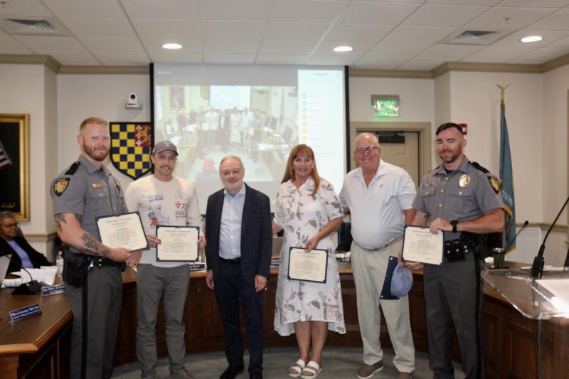 Three residents, two police officers presented with life-saving awards ...