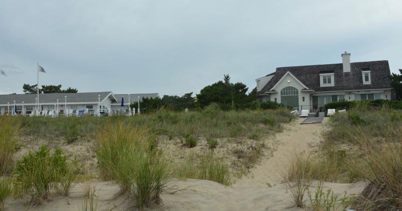 Lawsuit filed over wooden walkway crossing dune | Cape Gazette