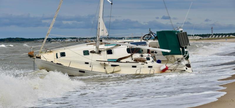 Sailboat washes up on Lewes Beach
