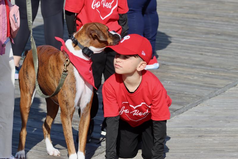 Xayn Manall and Boomer are ready to take on the 3-mile Heart Walk route.