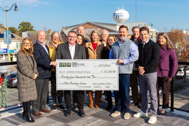 Check presentation attendees shown are (l-r) Zaida Guajardo, CBH senior director of development; Bill Lingo; Janice Lingo; Rich Garrett, CBH executive director; Ann Lingo; Shaun Tull; Erica Tull; John Lingo; Staci Hammonds; Doug Motley; Bryce Lingo; Nick Hammonds; and Tara Becker, CBH vice president of advancement. SUBMITTED PHOTO