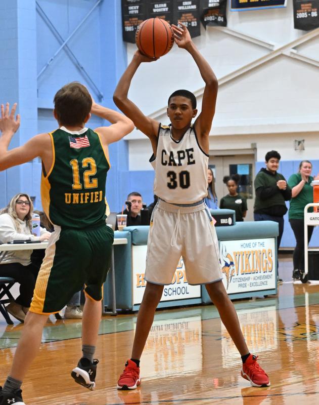 Zane Richardson looks to pass inside.