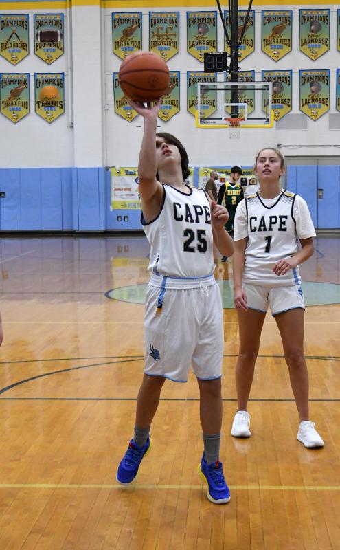 Aiden Curran takes a shot in the paint.