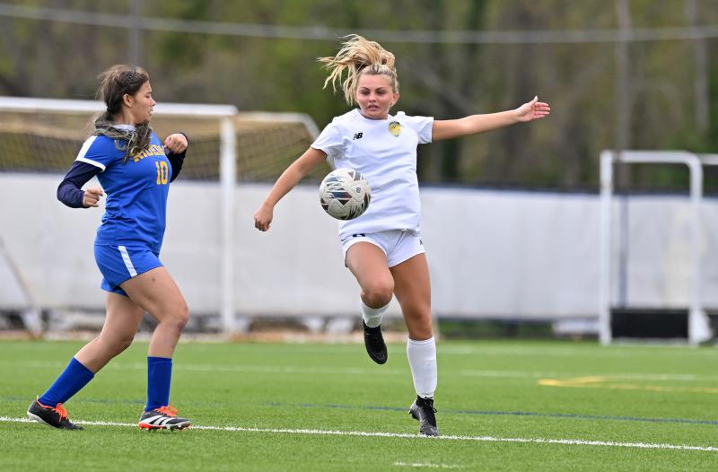 Cape freshman JV player Alyssa DeRiancho gets major air to control a ball from CR’s Lillian Poliquin in the Vikings’ JV victory.