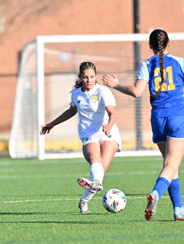 Cape freshman Kailey McMahon boots the ball upfield.