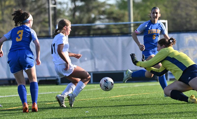 Cape freshman Elizabeth Downer blasts a shot that’s saved by CR keeper Eva Sheppard.