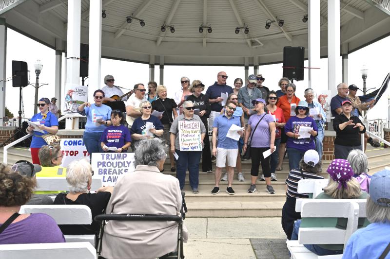 The crowd participates in a sing-along.