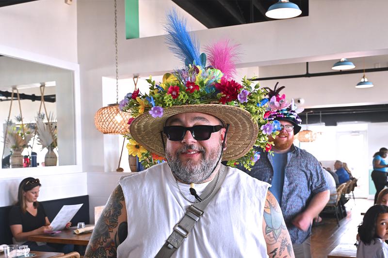 Toni DeAngelis plays it cool in his flower-bedecked creation.