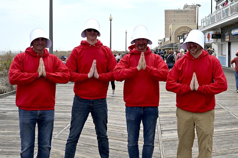 Pausing for a photo, (l-r) Micheal White, Tim Ferguson, Mark Lenard and Joe Gfaller were perhaps feeling a bit dystopian when they chose “The Handmaid’s Tale” as their outfits’ theme.
