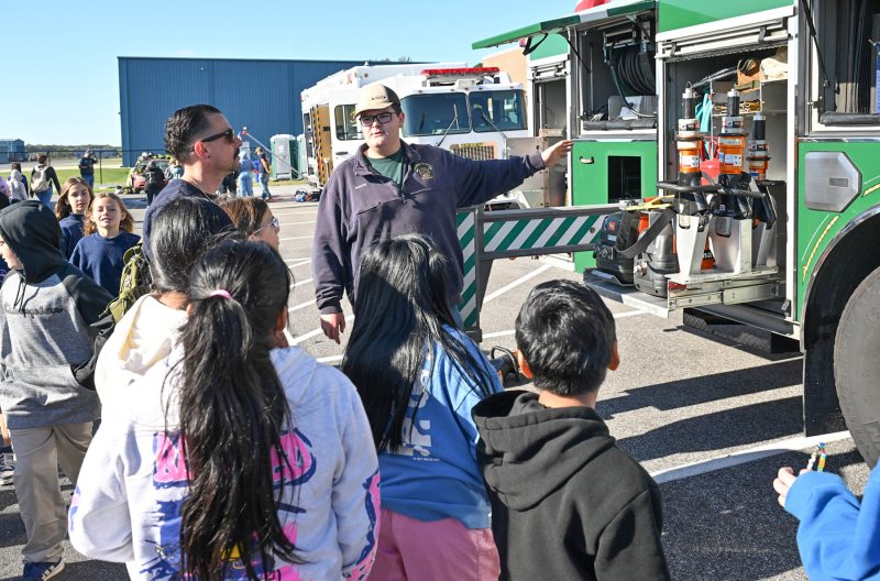 Mason Hague of the Greenwood Volunteer Fire Company explains the use of hydraulic tools by firefighters.