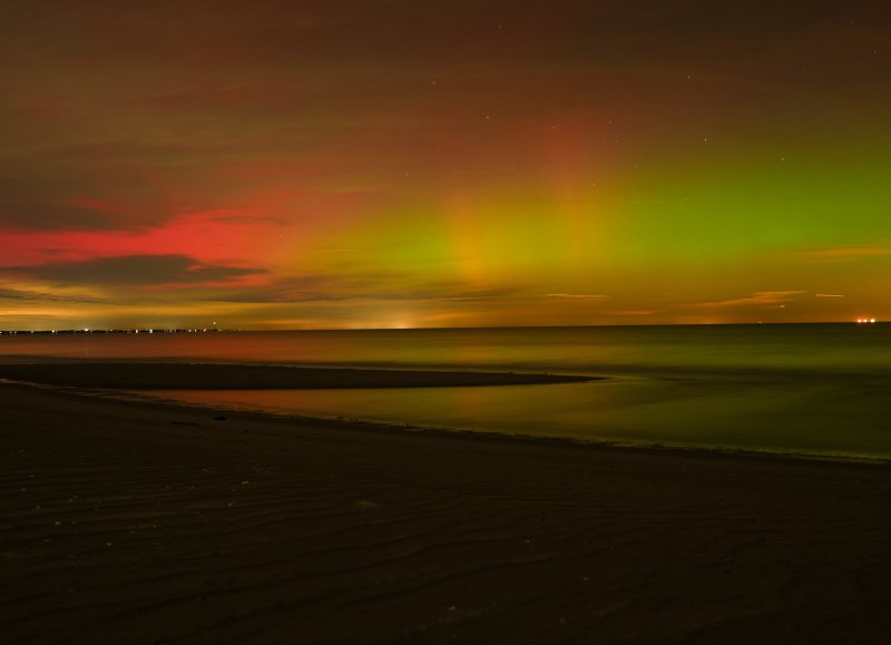 The Lewes sky glows green and red over the Delaware Bay Nov. 11.