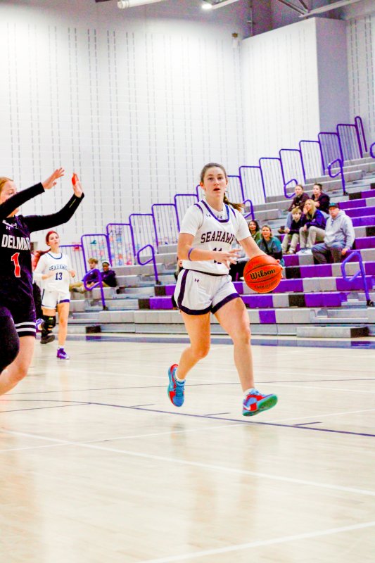 Sussex Academy sophomore Reilly Mobilia cuts into the lane.