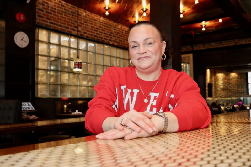 Ashley Marvel at Rose & Crown in Lewes Feb. 19. Marvel is a server at the restaurant. She survived a widow maker heart attack in November. Her advice to everyone, especially women, is to not ignore the warning signs. BILL SHULL PHOTO