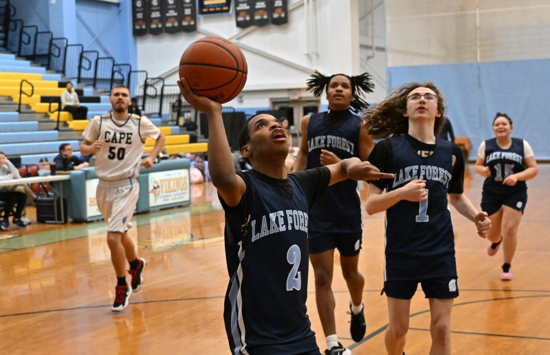 Aliki Long hits a shot for the Spartans.