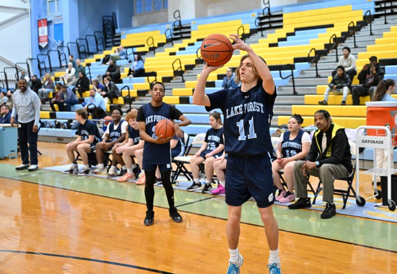 Lake’s Talan Gerardi takes a shot from the side in the three-point contest.