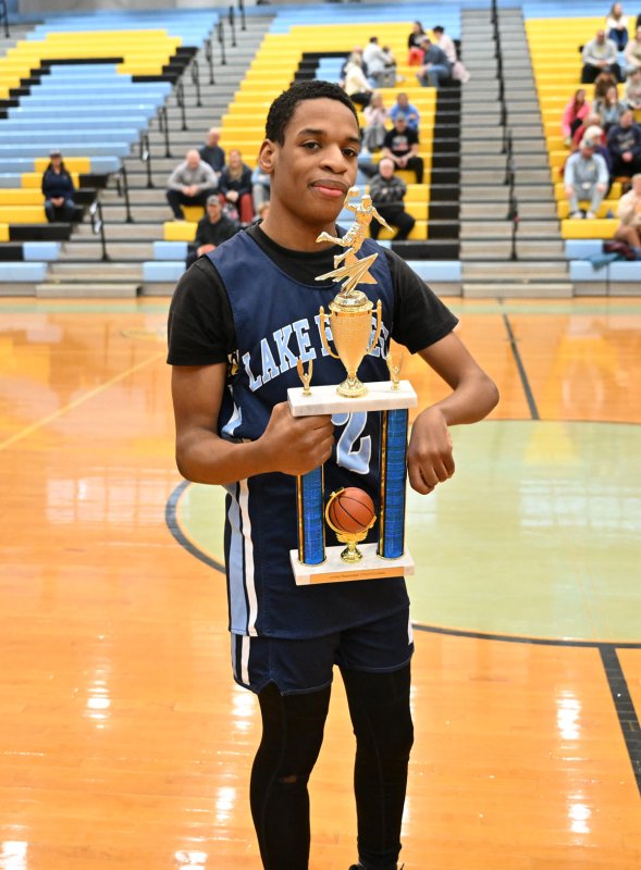 Lake senior Aliki Long wins the three-point contest.