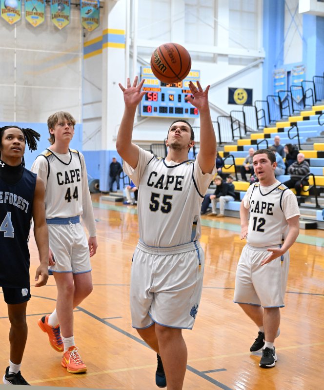 Cape’s Austin Hastings gets a basket.