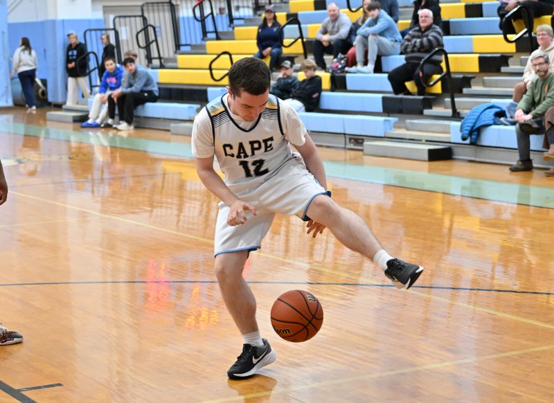 Zackary Valles performs some ball handling before taking a shot.