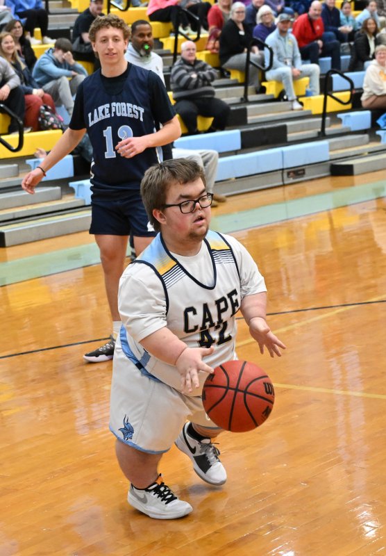 Cape sophomore Norman Rust drives to the paint in the 67-67 tie.