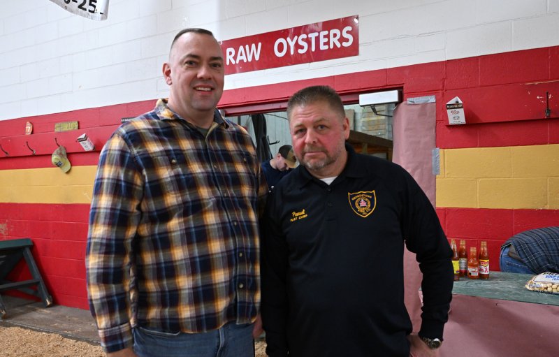 Waiting for the crowd are Sen. Brian Pettyjohn, R-Georgetown, and Georgetown Fire Chief Barrett Penuel.