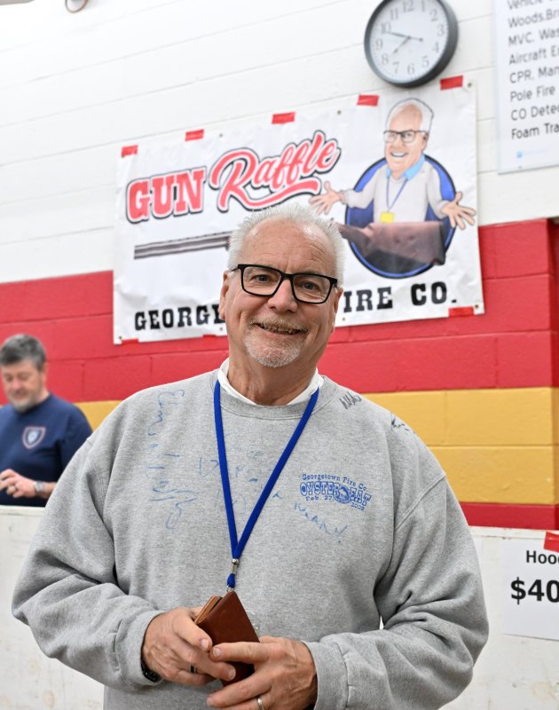 Life member Gregg Davis donated the gun to be raffled off to Jeff Oster. Davis comes to this event each year from his home in North Carolina.