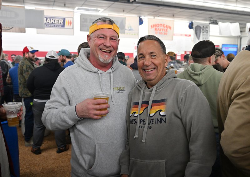 Friends enjoying the event are Aaron Williams, left, and Don Burch.