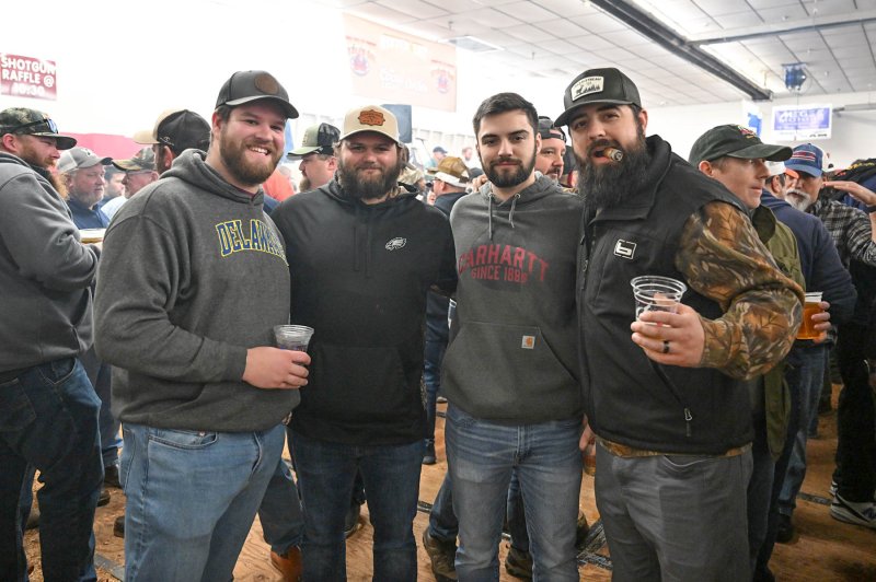 Locals having a great time are (l-r) Tom Weeks and Liam, Owen and Jared Zolper.