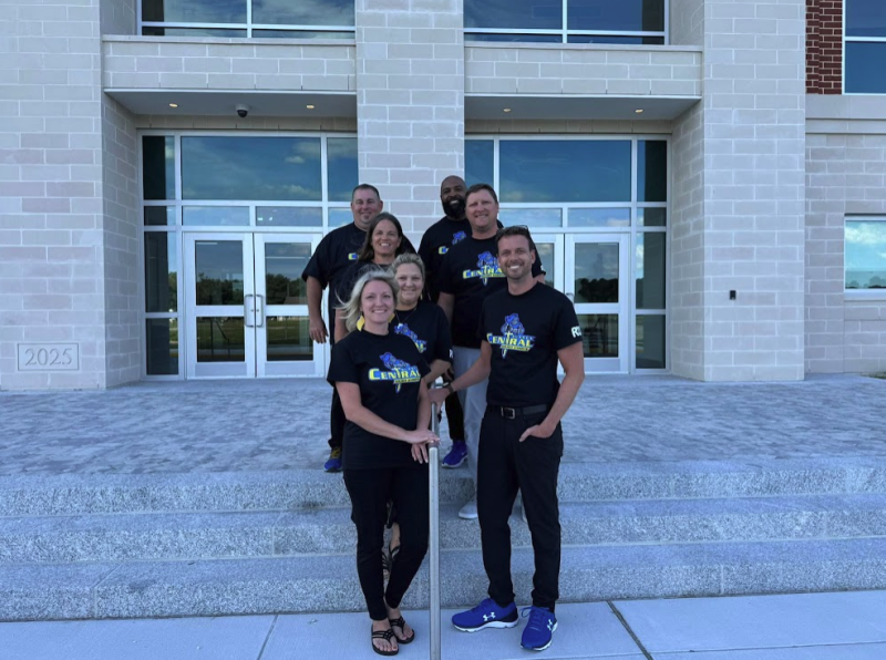 James Wheatley has been sharing the skills he’s picking up through the UD Principal Preparation Program with his colleagues at Sussex Central High School. Shown in front of the school are in back (l-r) Nik Fair, Karen Oliphant, Aerin Donovan, David Carter and Tyler Dickerson. In front are Melissa White and Wheatley. SUBMITTED PHOTO